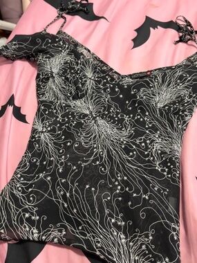Black Floral-Print Off-The-Shoulder Top by Hot Kiss